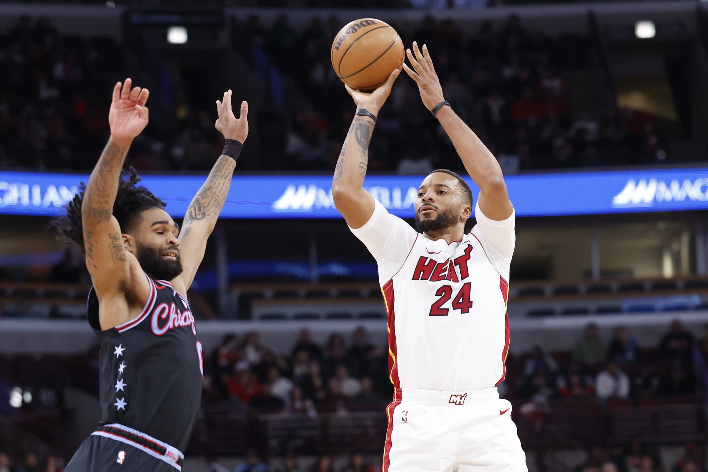 Heat beat Chicago 116-113 in a tight game